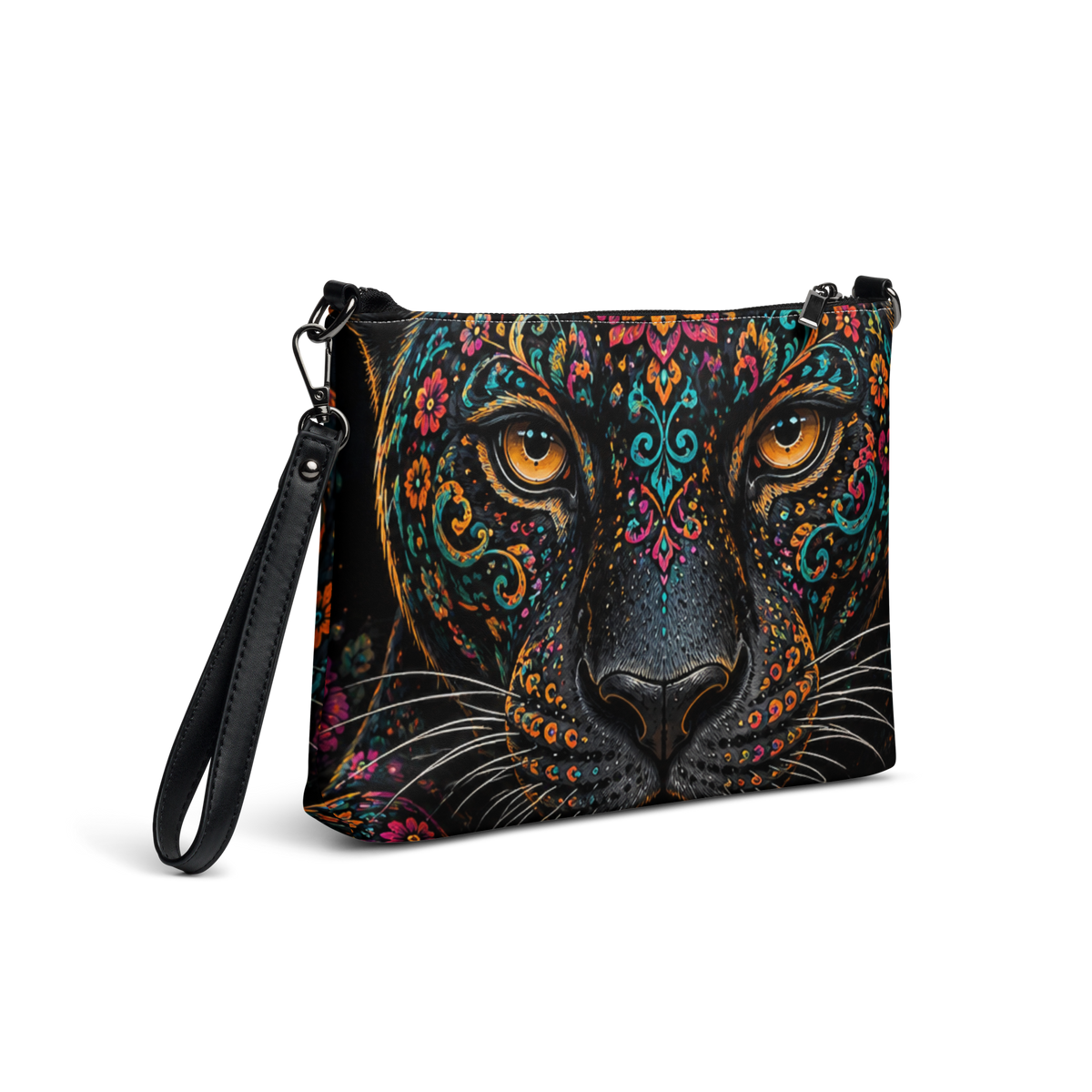 A black crossbody bag featuring a highly detailed, colorful graphic print of a leopard face with ornate mandala patterns and bright orange eyes.