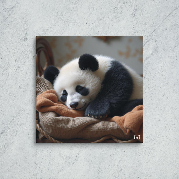 Panda bear lying on a brown blanket with a textured gray background
