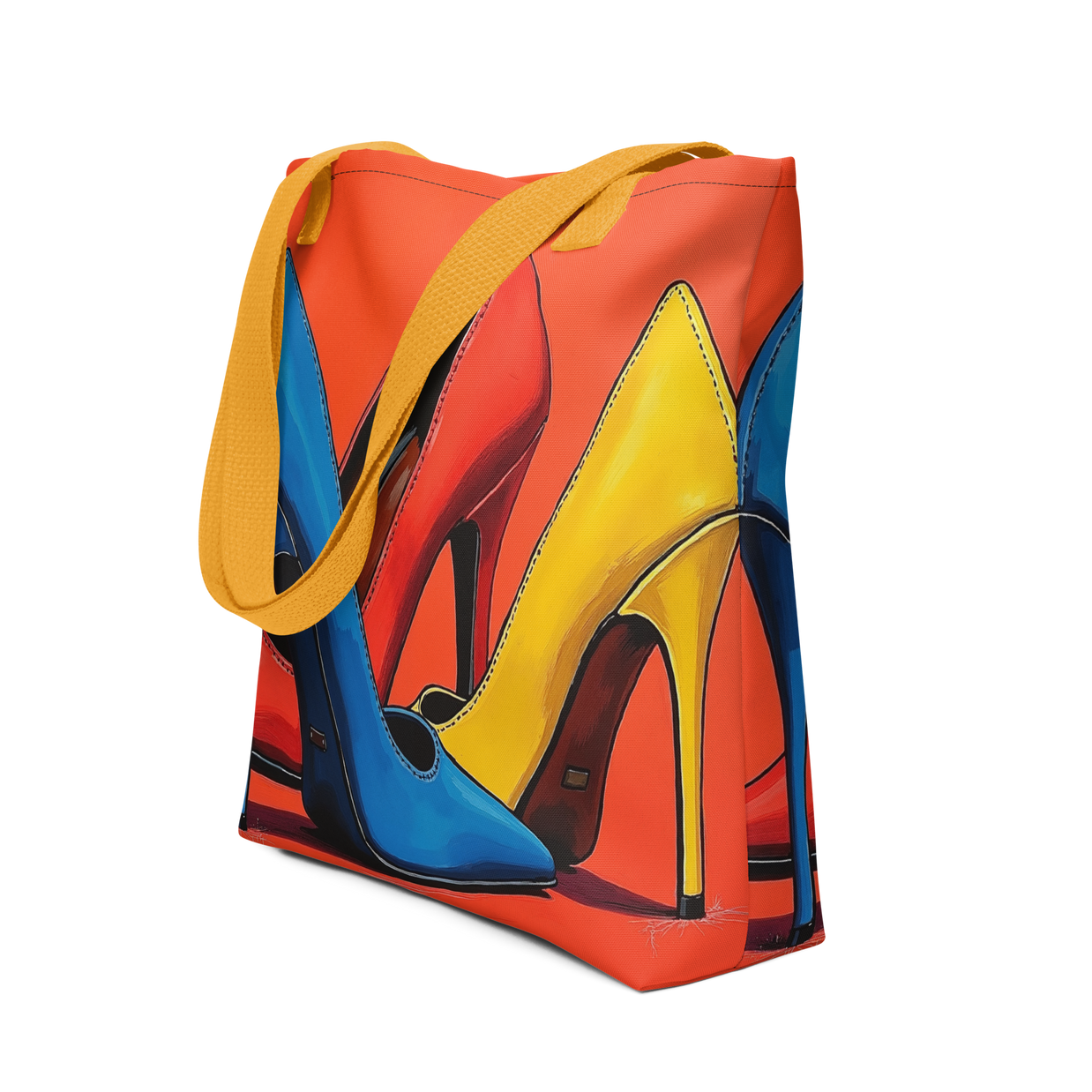 A tote bag with a vibrant graphic print of high-heeled shoes in blue, yellow, and red, featuring mustard yellow shoulder straps, shown on a plain white background.