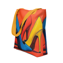 A tote bag with a vibrant graphic print of high-heeled shoes in blue, yellow, and red, featuring mustard yellow shoulder straps, shown on a plain white background.