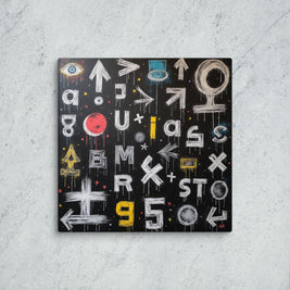 Abstract artwork with symbols and letters on a textured surface
