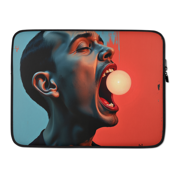 A laptop sleeve featuring a stylized graphic print of a man's face blowing a bubblegum bubble, split diagonally between a blue-gray background and a red background, shown on a white studio background.